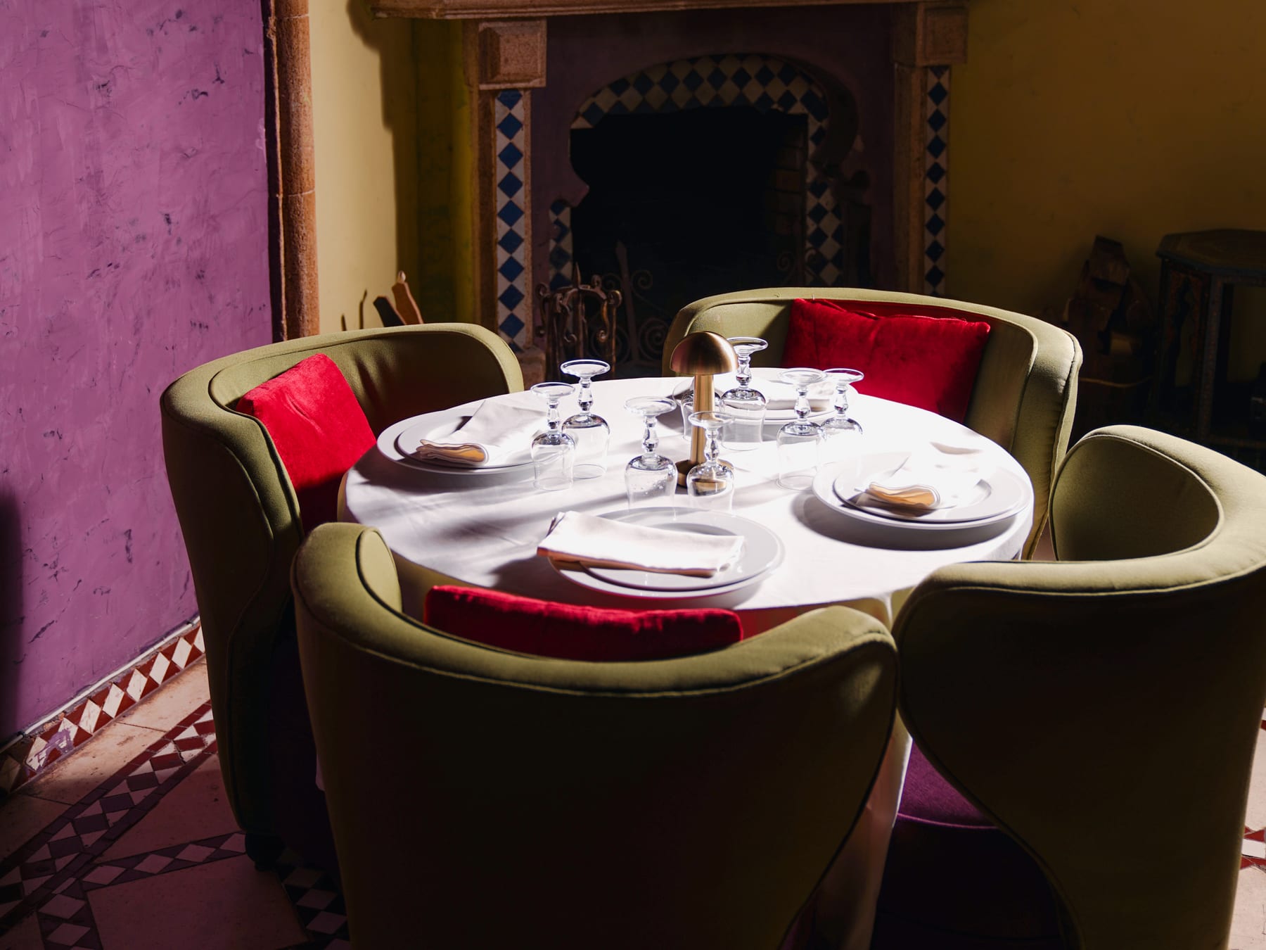 Private dining room with burgundy seating at Dinarjat