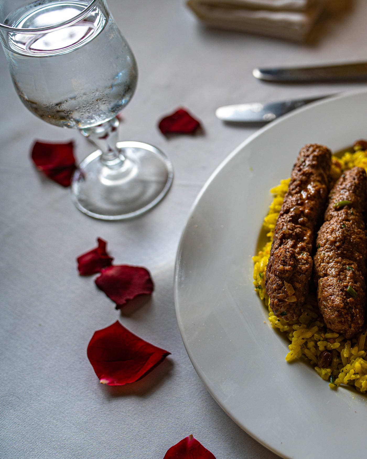 Grilled skewers served with saffron rice